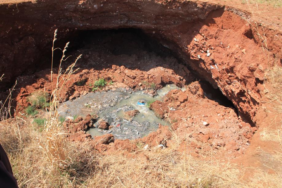 Huge amounts of sewage is spilling into the new sinkhole.