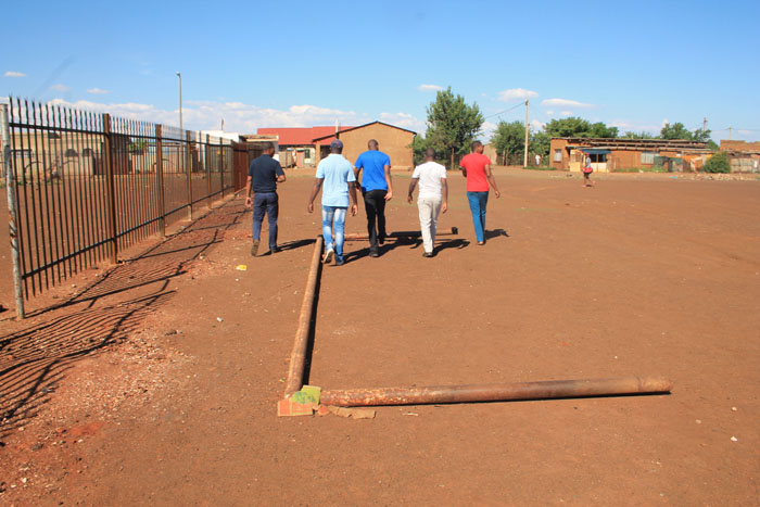 Residents are angry that the goalposts have been moved and their soccer field is under threat.