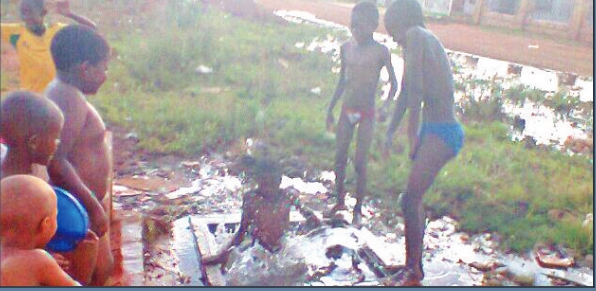 Young kids swimming at the main hole