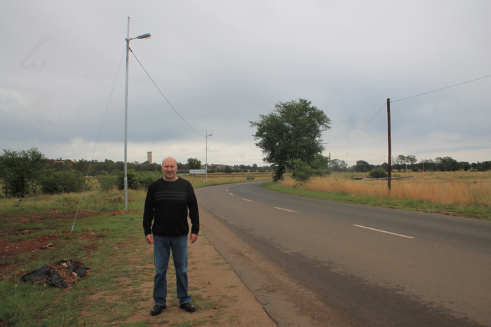 Mr Carlos Rebelo aagainst a backdrop of street lights that haven’t worked for some time.