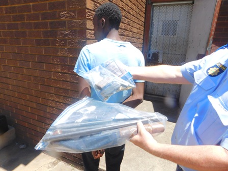 A man was arrested on saturday after Police received a tip-off about an armed robbery in Mooilande. The arrested suspect was found with a bag containing a pistol and a shotgun.