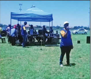 Khutsong SAPS crime prevention officer, Const. Zonke Dyosini addresses the audien ce.