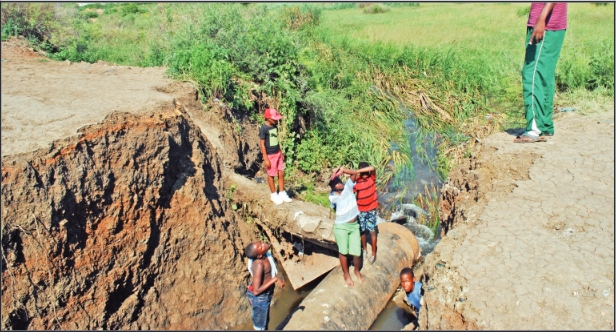 A clear view of what the damaged road looks like.