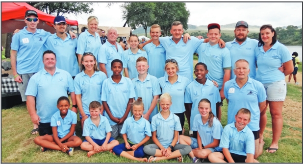 The swimmers who took part in the event, from the front row, are Aaliyah Mabanga (600 m); Gerrie Jnr Jnr Grove (600 m); Marisan Grove (1.2 km, 600 m); Anke Kruger (600 m); Bianca Janeke (1.2 km) and Tiaan Wolfaardt (1.2 km). In the middle are Gerrie Jnr Grove (1.2 km, 600 m); Annalisa Freese (3 km, 1.2 km, 600 m); Kealeboga Khoza (1.2 km, 600 m), Julian Rheeder (1.2 km); Tammy van Niekerk (3 km, 1.2 km); Rameez Mabanga (1.2 km, 600 m) and Carsten Holfelder (3 km, 1.2 km, 600 m). In the back row are Michael Cuypers (1.2 km, 600 m); Ricus Collins (600 m); Sonja Kruger (600 m); Gerrie Grove (coach) (1.2 km); Caitlin Doran (1.2 km, 1.2 km); Diwan Wolfaardt (1.2 km); Keenen Grove (1.2 km); Divan Grove (1.2 km); Ben van Niekerk (1.2 km) and Sharlene van Niekerk (3 km, 1.2 km).