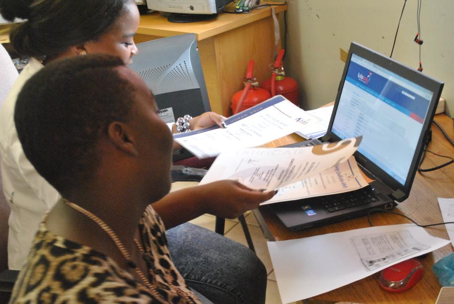 A job seeker being assisted to register on the databse