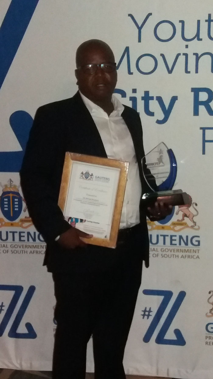 Mr Mike Msukwini just after he received his award.