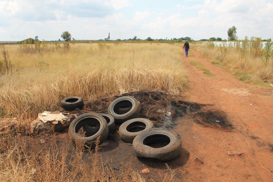 Some of the tires that were burned on Monday morning near the place where the new reservoir will be put up.
