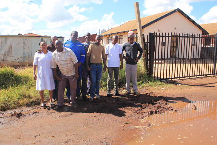 The frustrated community members who fixed the water leak themselves.