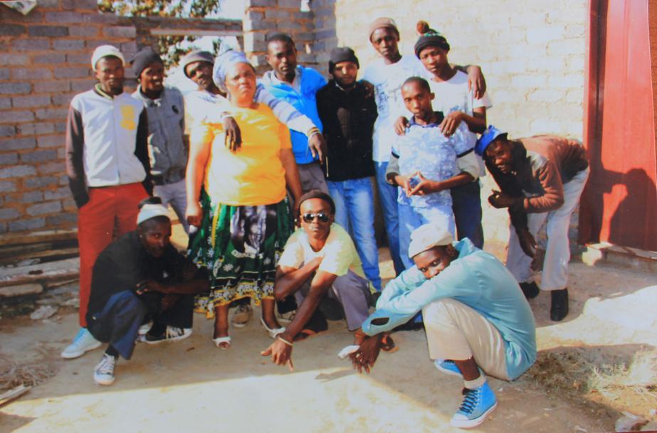 Mrs Mildred Nosamkelo Ndzilane with the gangsters she now claims were her son's friends.