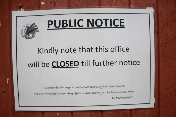 The signs put up against the door of the municipal pay point next to Thusanang Clinic.