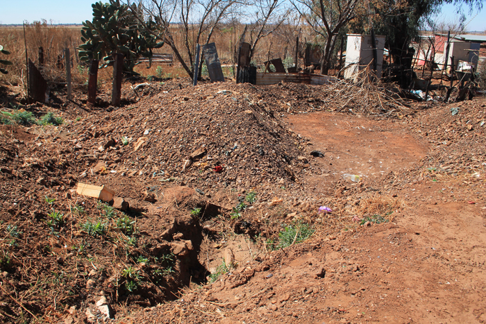 The site next to the informal settlement that the zama-zamas have dug up.