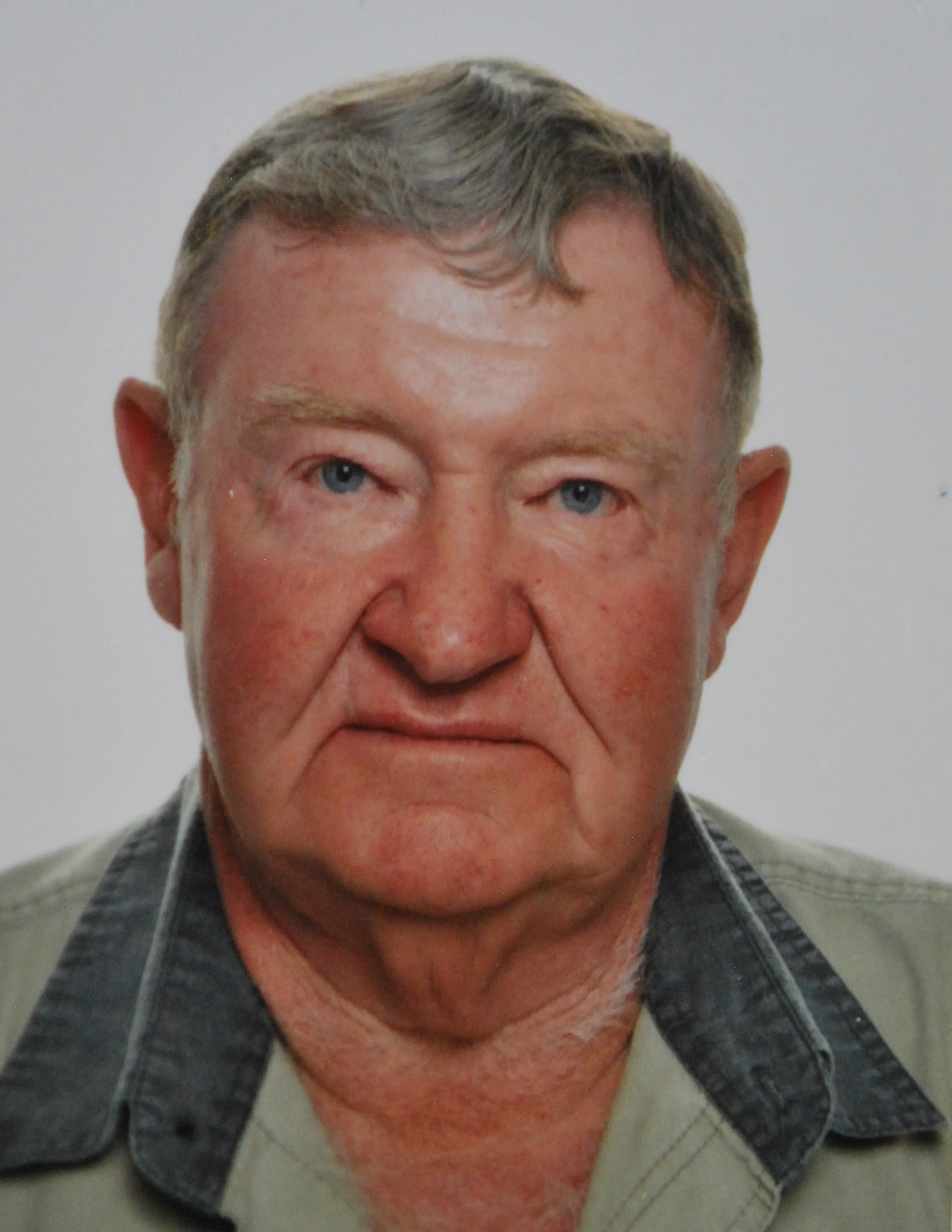 Oom Koos, wat deur rowers dood geskiet is.