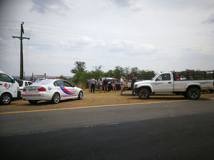 Vehicles of emergency services personnel and neighbours, who arrived at the scene shortly after the incident.