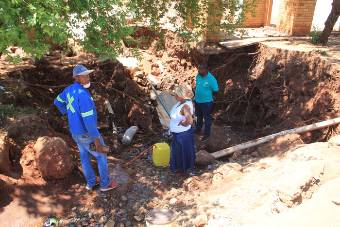 The new sinkhole caved in at the site where sewage was leaking for months.