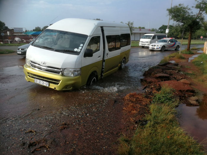 This photo, sourced from social media, shows the taxi that drove into the hole.