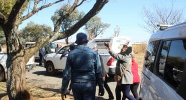 Although members of the police in Carletonville arrived at the scene, they left again because there was no eviction order.