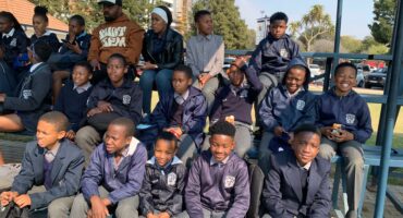 The proud hockey team at the big event.