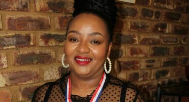 The proud Dipuo Qupe with her award.