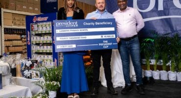 Peggy Sibanda received the donation for Fochville Secondary School, while Corne Erasmus received the donation for Losberg Primary School from Samuel Gontse (Group HR Manager).