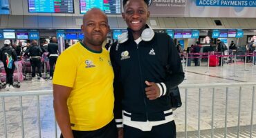 The well-known coach Hloni Kharejane with soccer star Shaun Els.