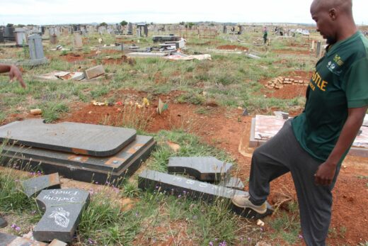 Brian Seobe, whose eyes were full of tears after he saw the damage to the gravestone of his late mother, Tseleng Emely Seobe.