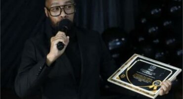 Thabo Ramaine, known as Mahavatar Ascendant, with his award.