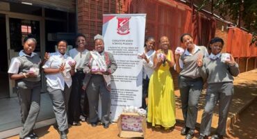 The caring CJ learner with Tswasungu learners.