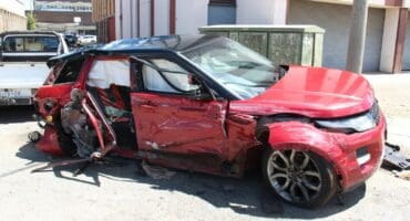 The man's Range Rover was badly damaged in the crash, but that is not the worst of his problems.