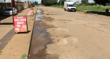 Some of the deep potholes in the Welverdiend CBD.