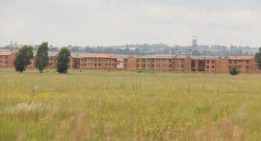 The thugs struck in the veld on the way to the Elijah Barayi mega housing complex.