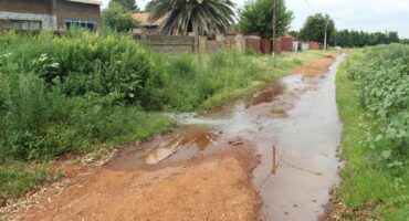 Sewage leaking from manholes in 26th Avenue in Welverdiend.