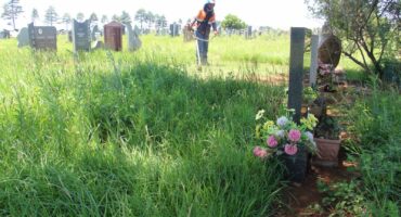 The only people cleaning the graveyard during the Herald's visit were employees of families whose loved ones are buried there.