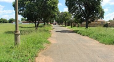 The man's body was discovered in a car next to the open yards in Hornstone Street.
