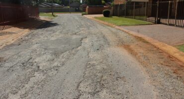 The terrible condition of Philip Street in Carletonville.