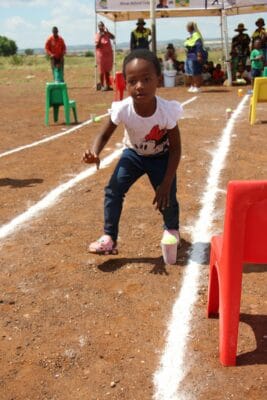 Little Angelina Maraya demonstrates intense focus during a timed co-ordination game.