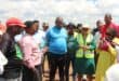 The Executive Mayor, Nozuko Best, and MMC for Public Safety, Lebogang Mangaliso, addressing the crowd and committee members near the site of the sinkhole across from Hlanganani Primary School on Friday.