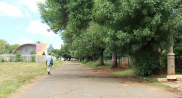 A pedestrian walks through the area in Orpiment Street where the incident took place.
