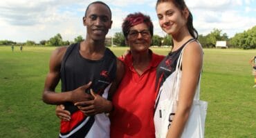 Sibusiso Ndiko and Mikayla Smit with their coach, Annetjie Smit.