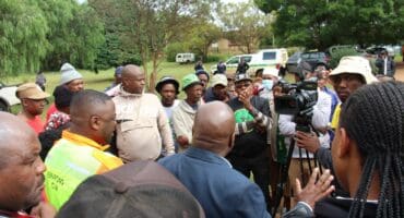 A group of community members, parents and local politicians gathered at the school the morning after the incident.