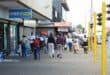 Pedestrians on the busy sidewalk outside the Pep Home store, which was struck by robbers over the weekend. Photo: Adele Louw