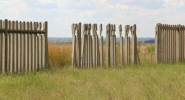 Some of the broken fencing at the side of the graveyard. Photo: Adele Louw (Carletonville and Fochville Herald)