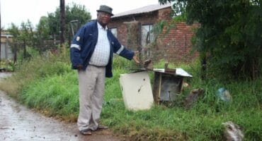 Prince Molepo shows one of the electricity boxes that was plundered by cable thieves last week. Photo: Adele Louw (Carletonville and Fochville Herald)