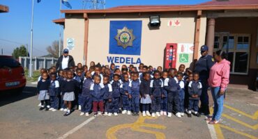 The enthusiastic youngsters in front of the police station. Photo: Supplied