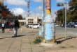 These lamp poles covered with illegal posters are right across the street from the municipality. Photo: Adele Louw (Carletonville and Fochville Herald)
