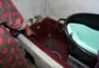 The affected residents such as Christina Modikoga have to reuse all the water they can. Photo: Adele Louw (Carletonville and Fochville Herald)
