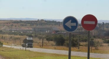 The traffic island near the entrance to Mponeng mine is one of the regular places where motorists are used to slowing down due to the fact that there has been a traffic camera at this spot for years.