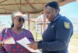 Sergeant Zikhona Sifuna of the police in Wedela during the action. Photo: Supplied