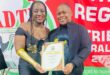 SADTU’s Fochville branch education convenor Tshepo Seeri (right), handing over an award to Ms M.G. Nhlapo. Photo: Supplied