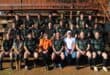 Die Scorpions se eerste span sit hier trots in hul nuwe rugbytruie saam met hul borge. Foto: Verskaf