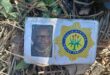 The fake police ID was found close to the murdered victim. Anyone who recognises the man in this photo must immediately contact the police in Carletonville.